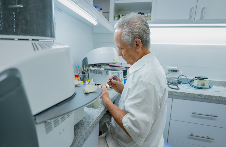 Dental Specialist Crafting a Dental Prosthesis